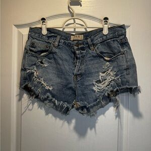 357- Free people ripped Jean shorts
